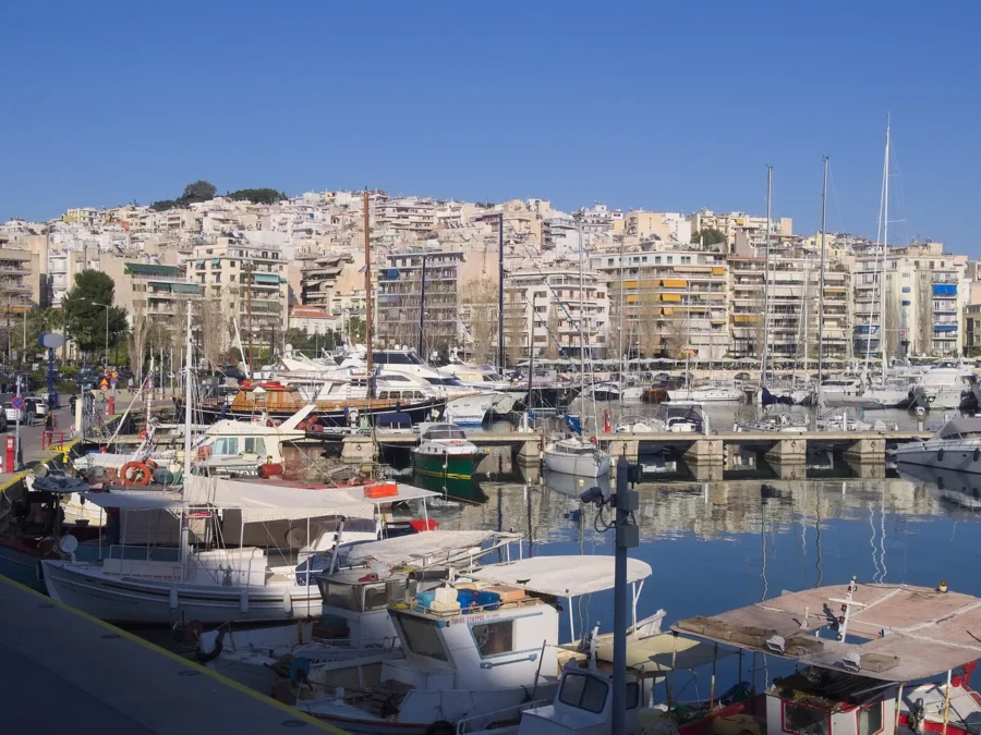 Boats and waterfront buildings at Marina Zeas in Piraeus
