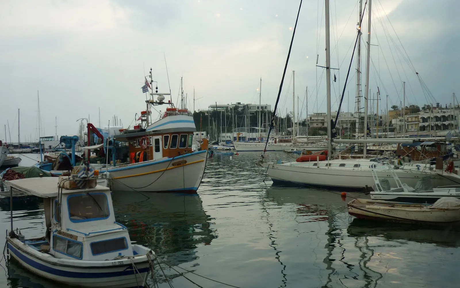 Fishing boats and waterfront at Mikrolimano harbour in Piraeus